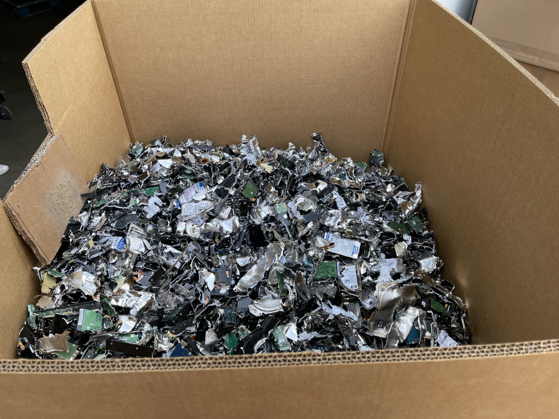 Shredded hard drives after destruction at Prime Asset Recovery facility
